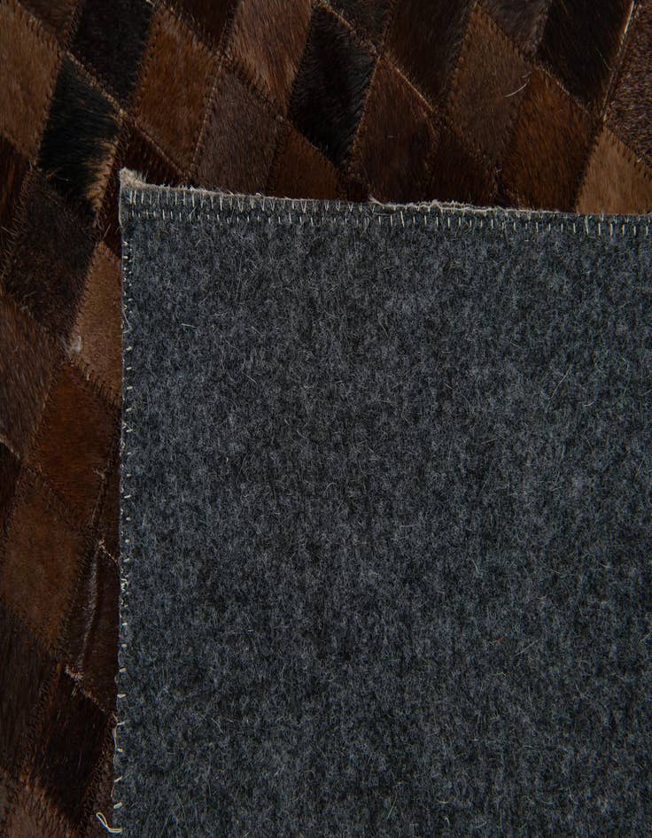 Detail image of  8' x 9' 9 Cowhide Stocks Rug