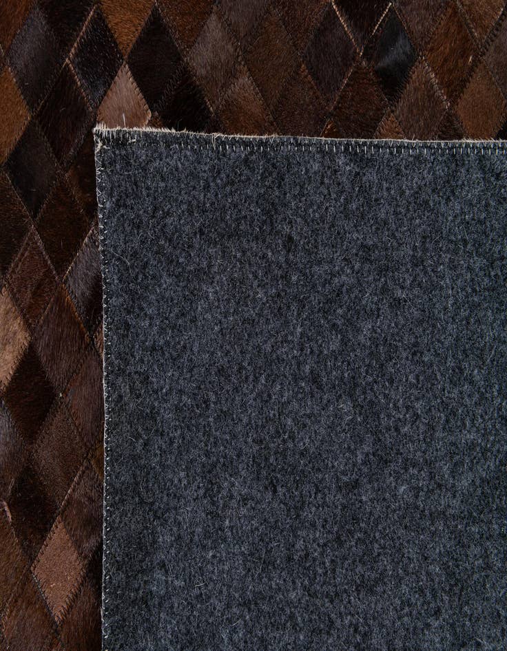 Detail image of  8' 2 x 10' 1 Cowhide Stocks Rug