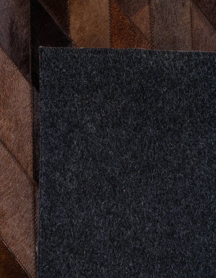 Detail image of  5' 8 x 8' Cowhide Stocks Rug