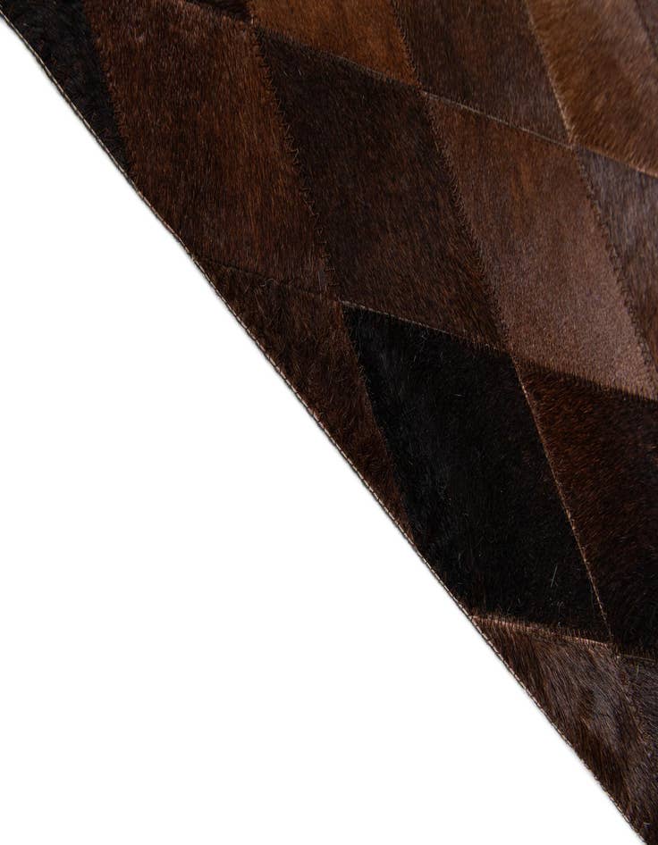 Detail image of  6' 7 x 9' 10 Cowhide Stocks Rug