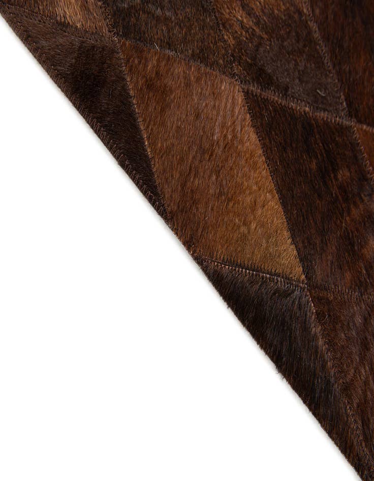 Detail image of  4' 8 x 6' 6 Cowhide Stocks Rug