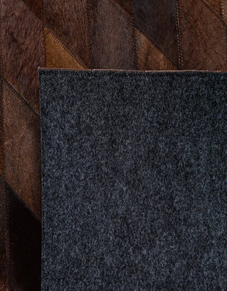 Detail image of  4' 8 x 6' 6 Cowhide Stocks Rug