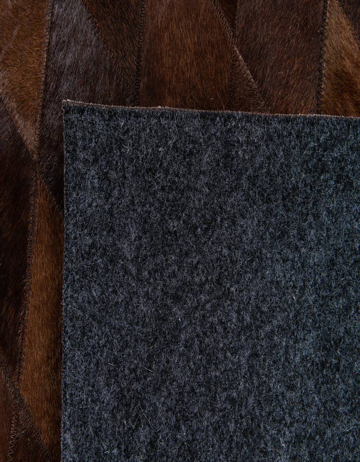 Detail image of  4' 7 x 6' 6 Cowhide Stocks Rug