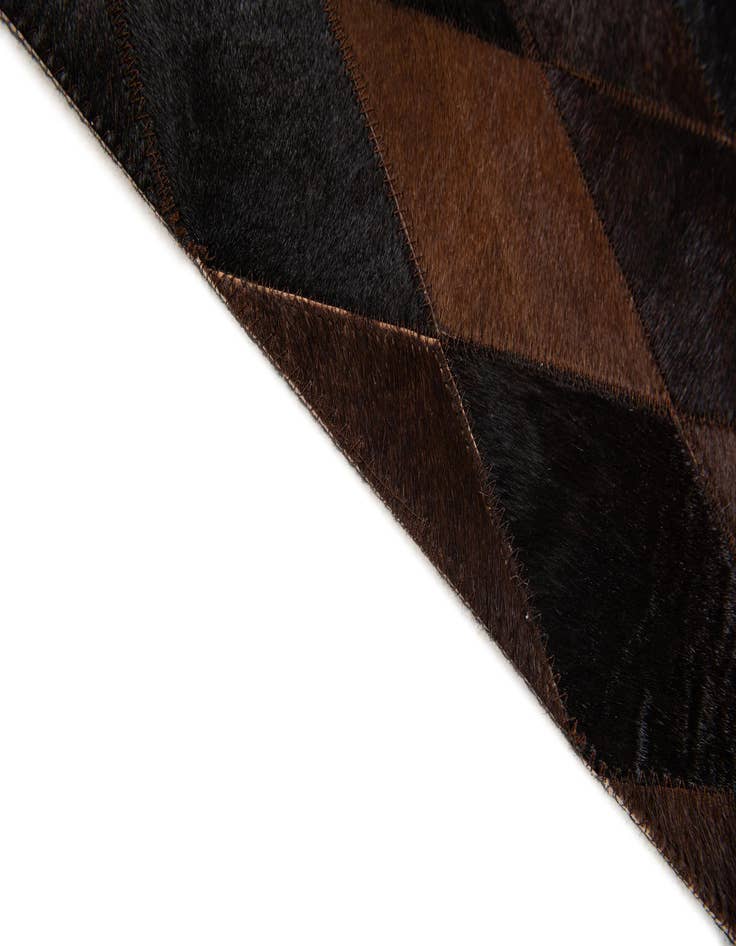 Detail image of  4' 1 x 5' 9 Cowhide Stocks Rug