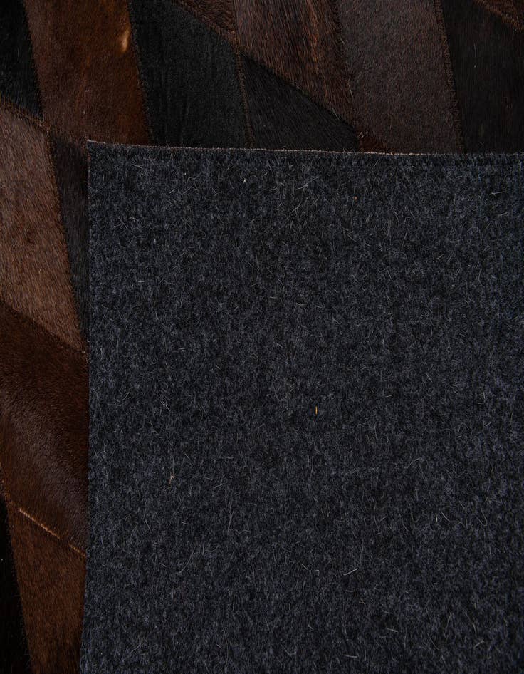 Detail image of  4' 1 x 5' 9 Cowhide Stocks Rug
