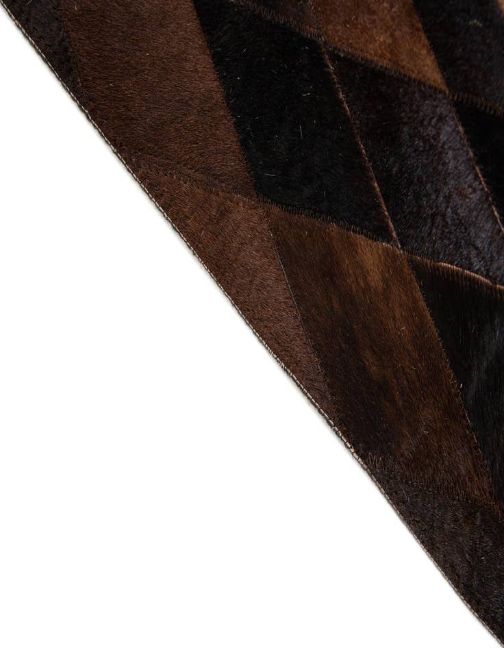 Detail image of  4' 1 x 5' 10 Cowhide Stocks Rug
