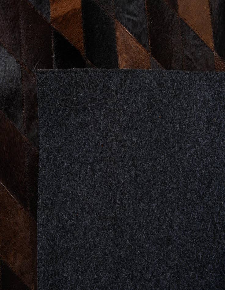 Detail image of  4' 1 x 5' 10 Cowhide Stocks Rug