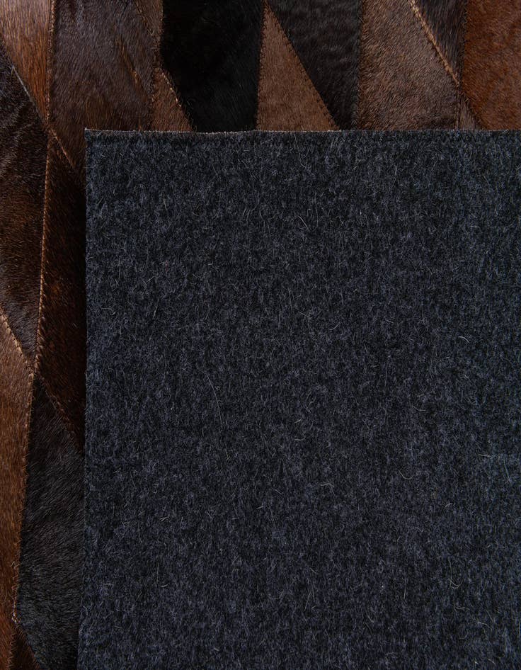 Detail image of  4' 1 x 5' 10 Cowhide Stocks Rug