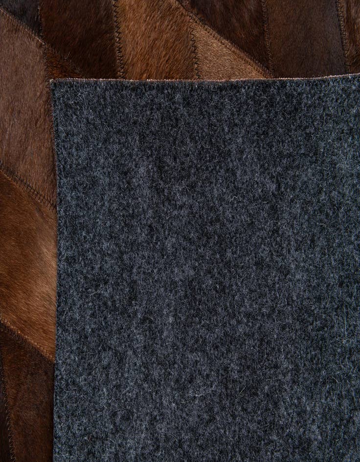 Detail image of  4' 1 x 5' 10 Cowhide Stocks Rug