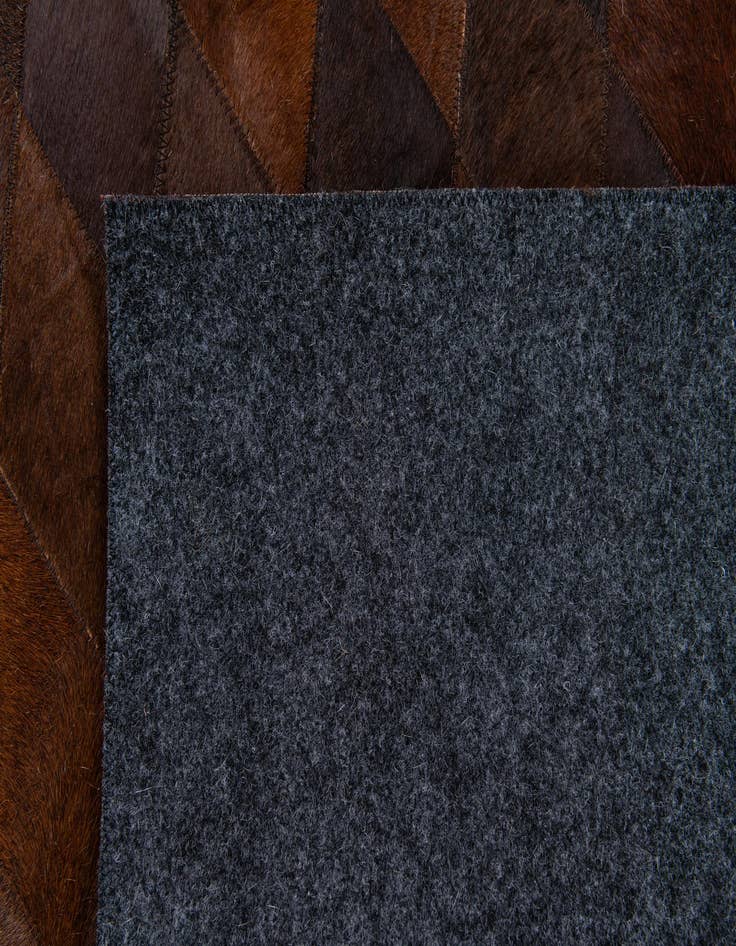 Detail image of  4' 1 x 5' 11 Cowhide Stocks Rug