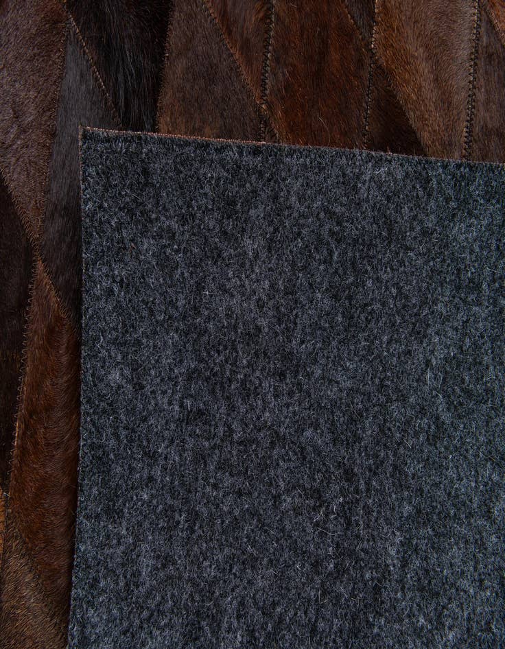 Detail image of  4' x 5' 10 Cowhide Stocks Rug
