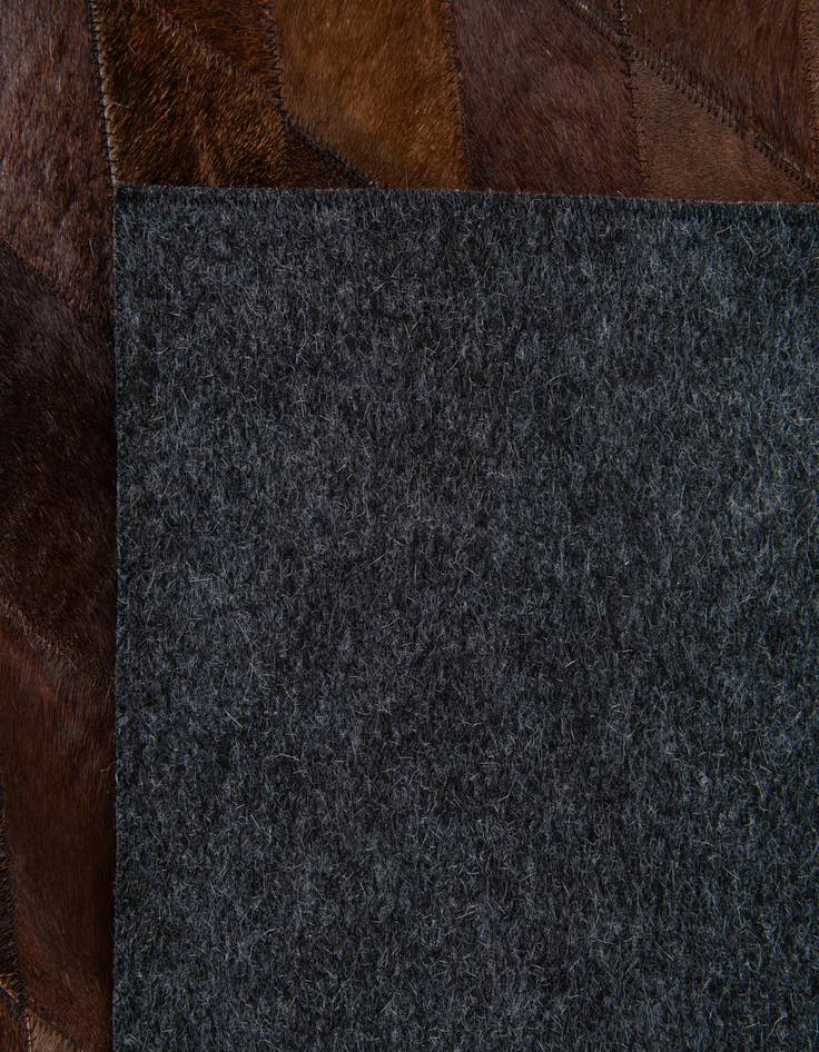 Detail image of  4' 1 x 5' 11 Cowhide Stocks Rug