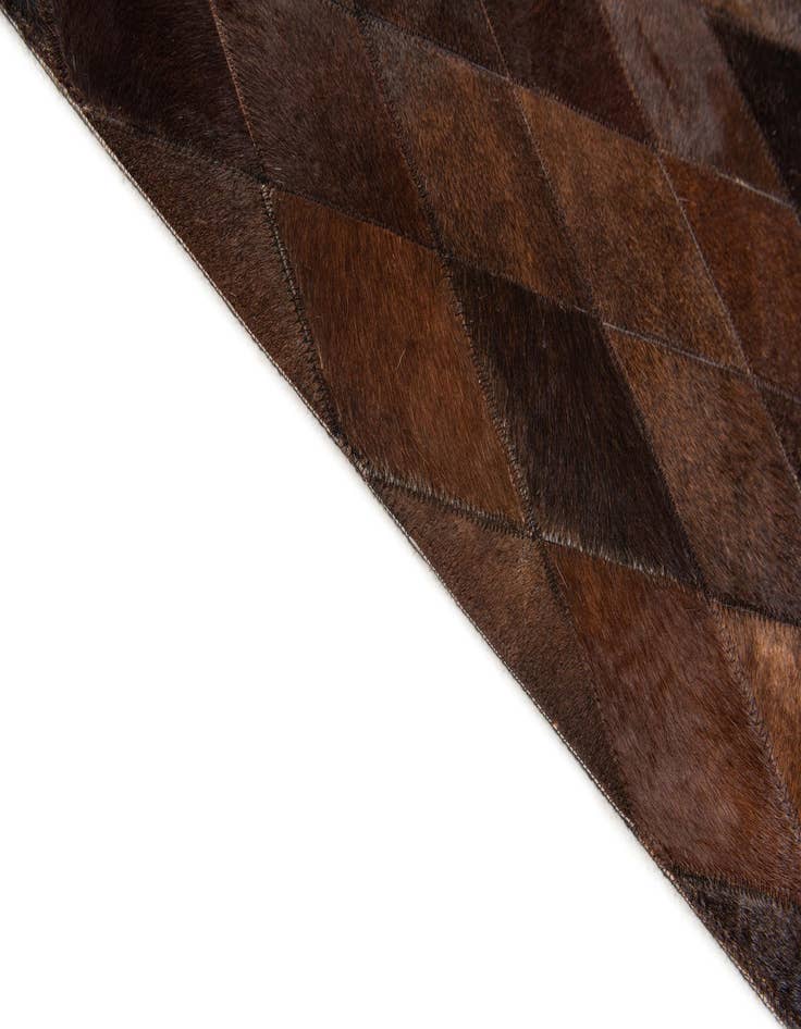 Detail image of  4' 1 x 5' 11 Cowhide Stocks Rug