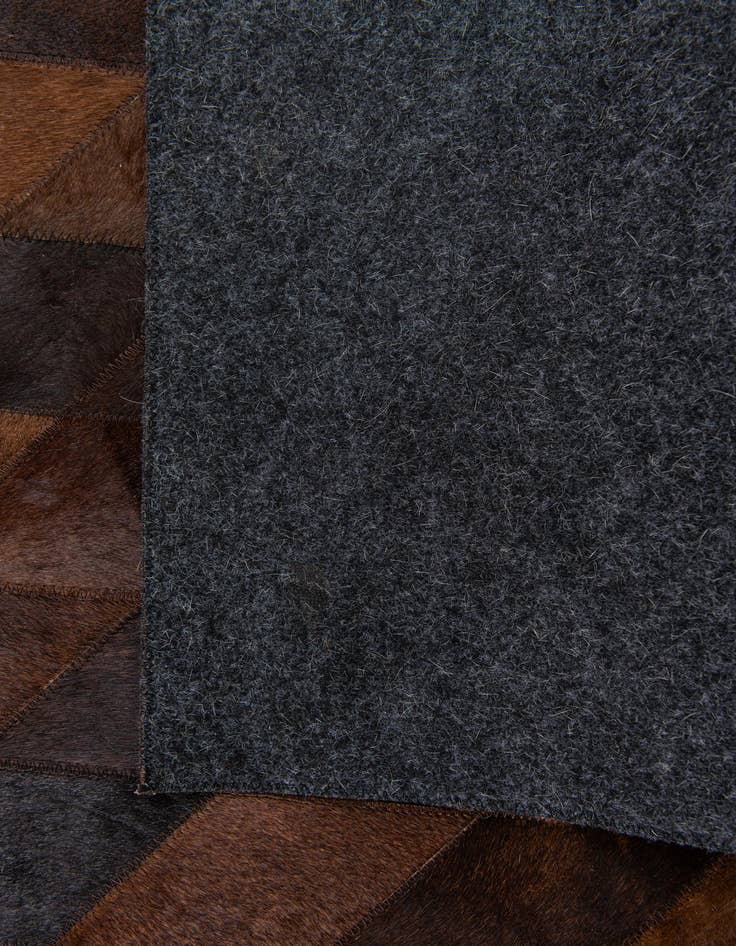 Detail image of  4' 1 x 5' 11 Cowhide Stocks Rug