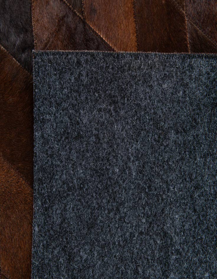 Detail image of  4' 1 x 5' 11 Cowhide Stocks Rug