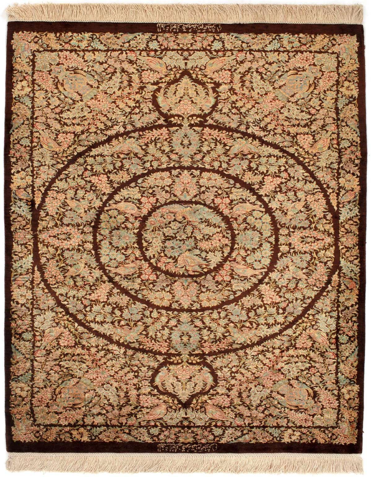 A 3x4 rectangular Ghom Silk rug with a rich brown background and intricate Persian floral and bird patterns in tans, pinks, and light blues.