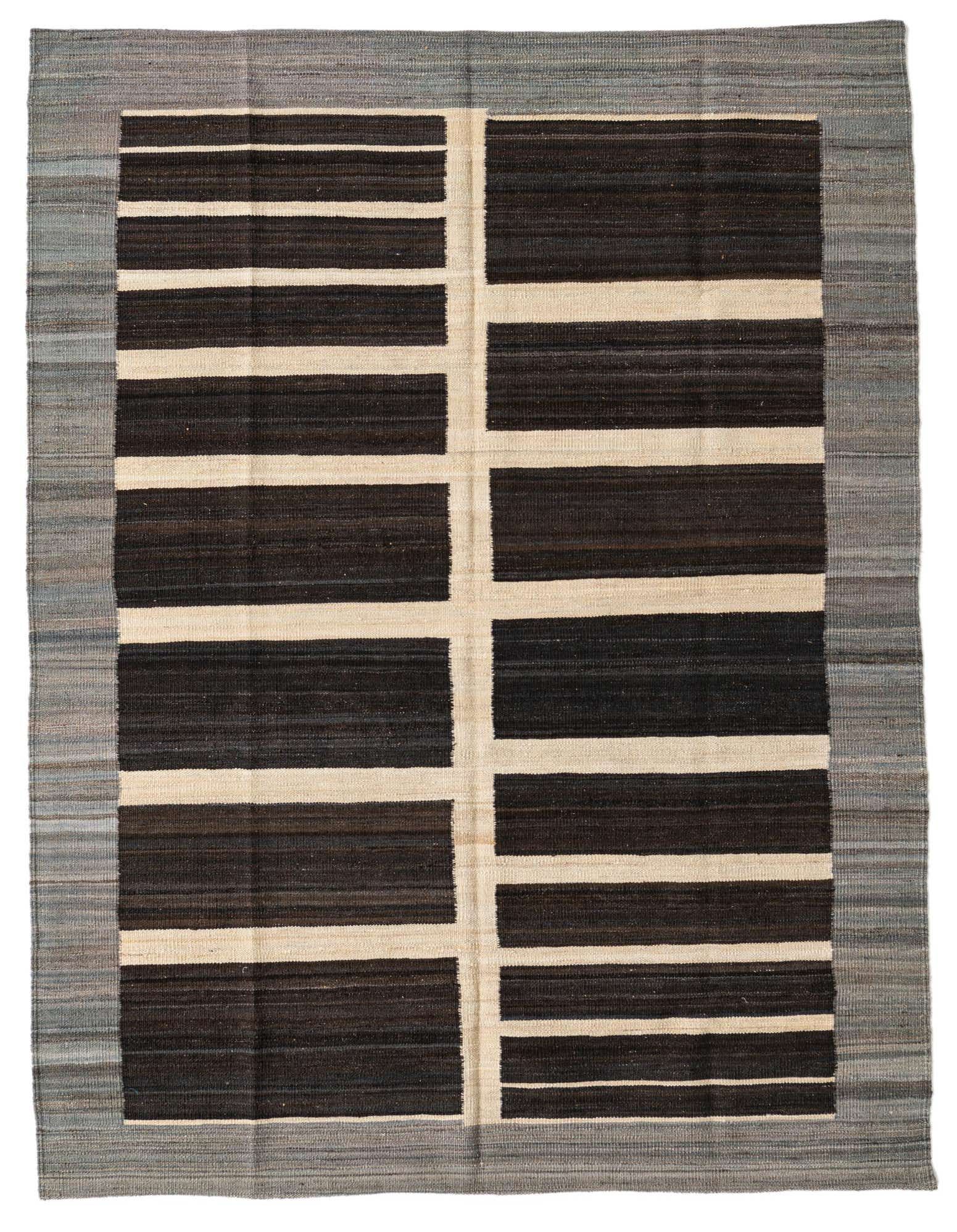 A 5x8 rectangular Kilim Modern rug with a tribal abstract pattern in browns, tans, and grey, featuring a flatweave texture.
