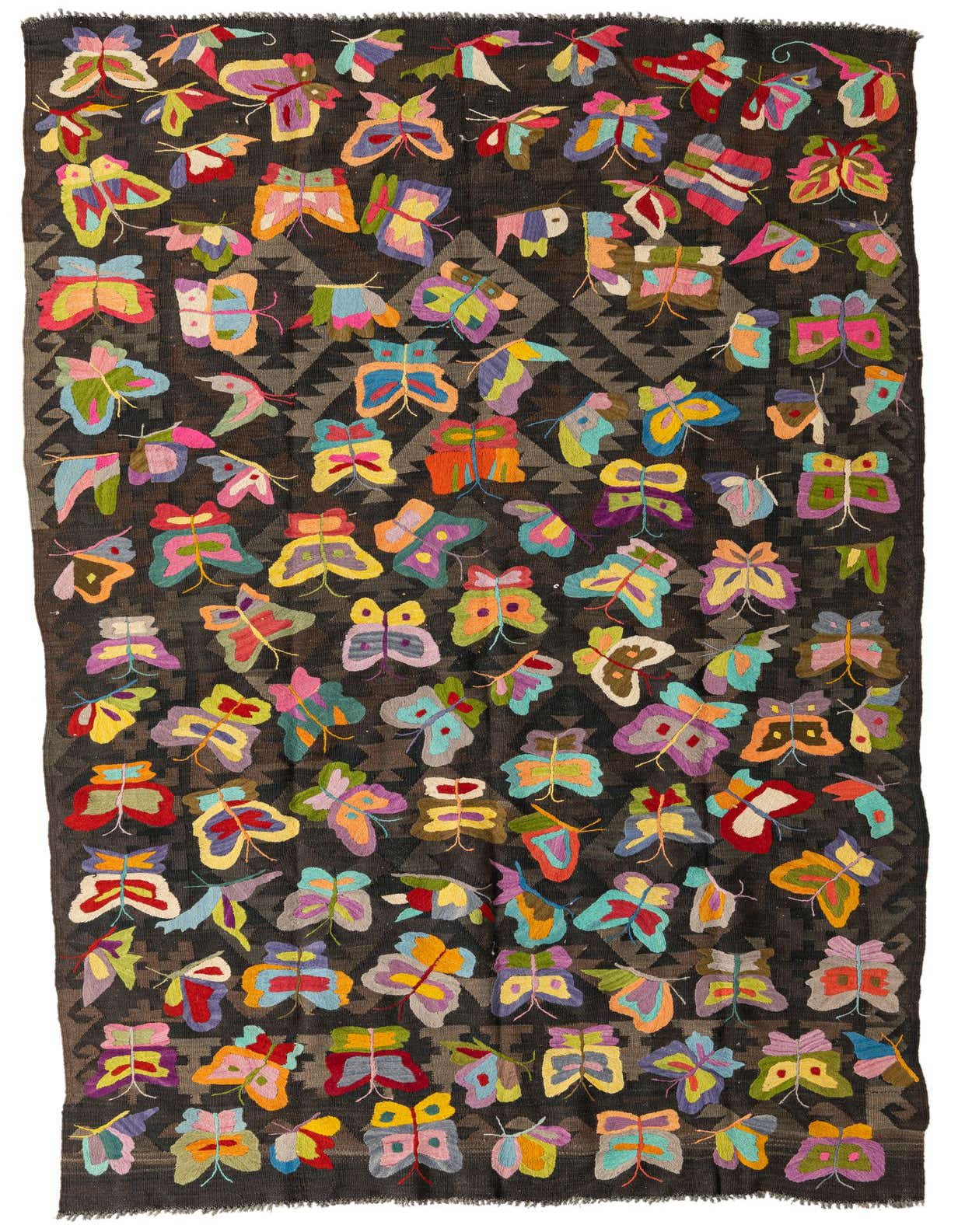 A 6x9 rectangular Kilim Suzani rug featuring a dark brown background with a subtle tribal pattern, adorned with numerous colorful embroidered butterflies.