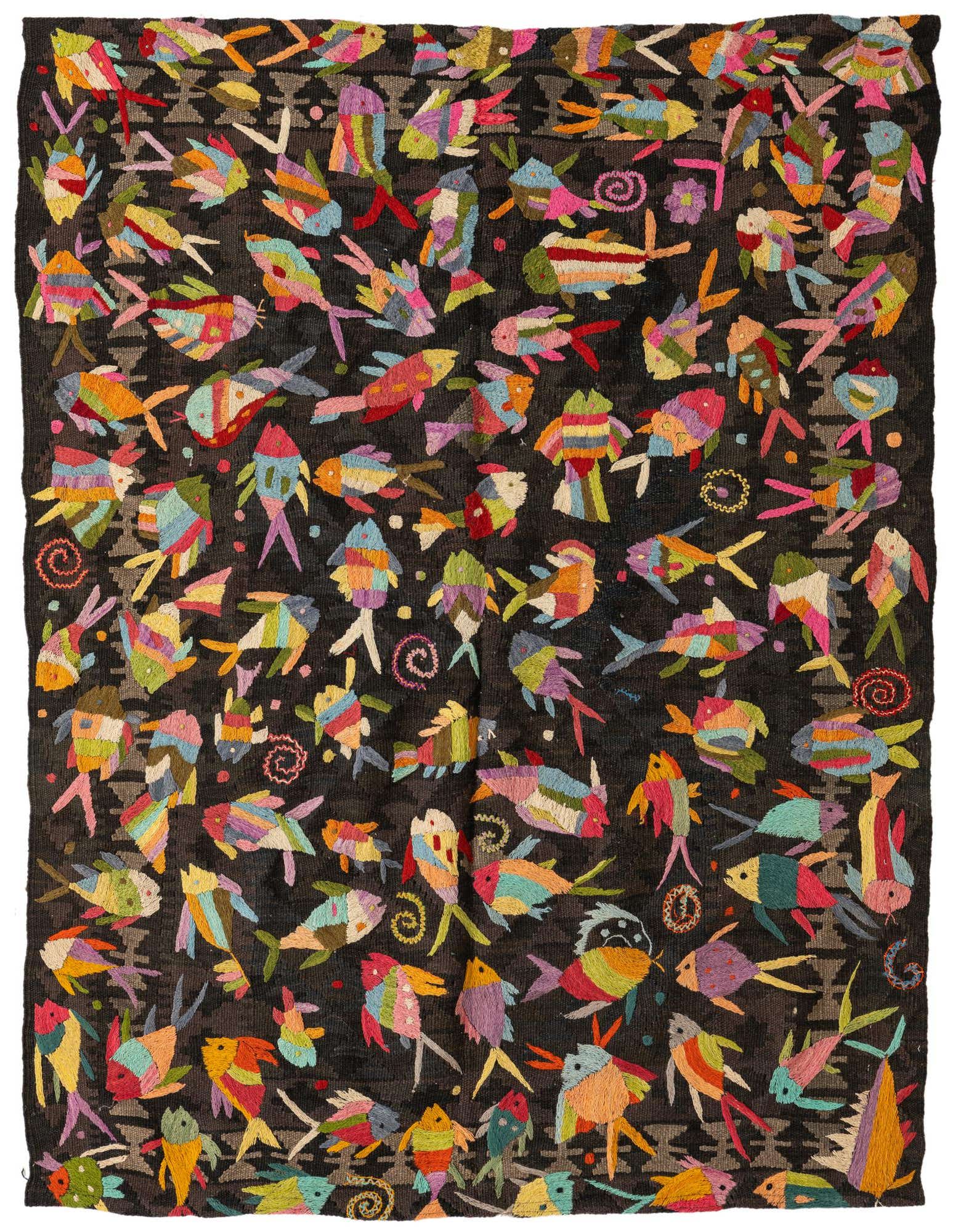 A rectangular 4x6 brown Kilim Suzani rug featuring a vibrant, multicolored fish pattern with tribal motifs, suitable for various indoor rooms.