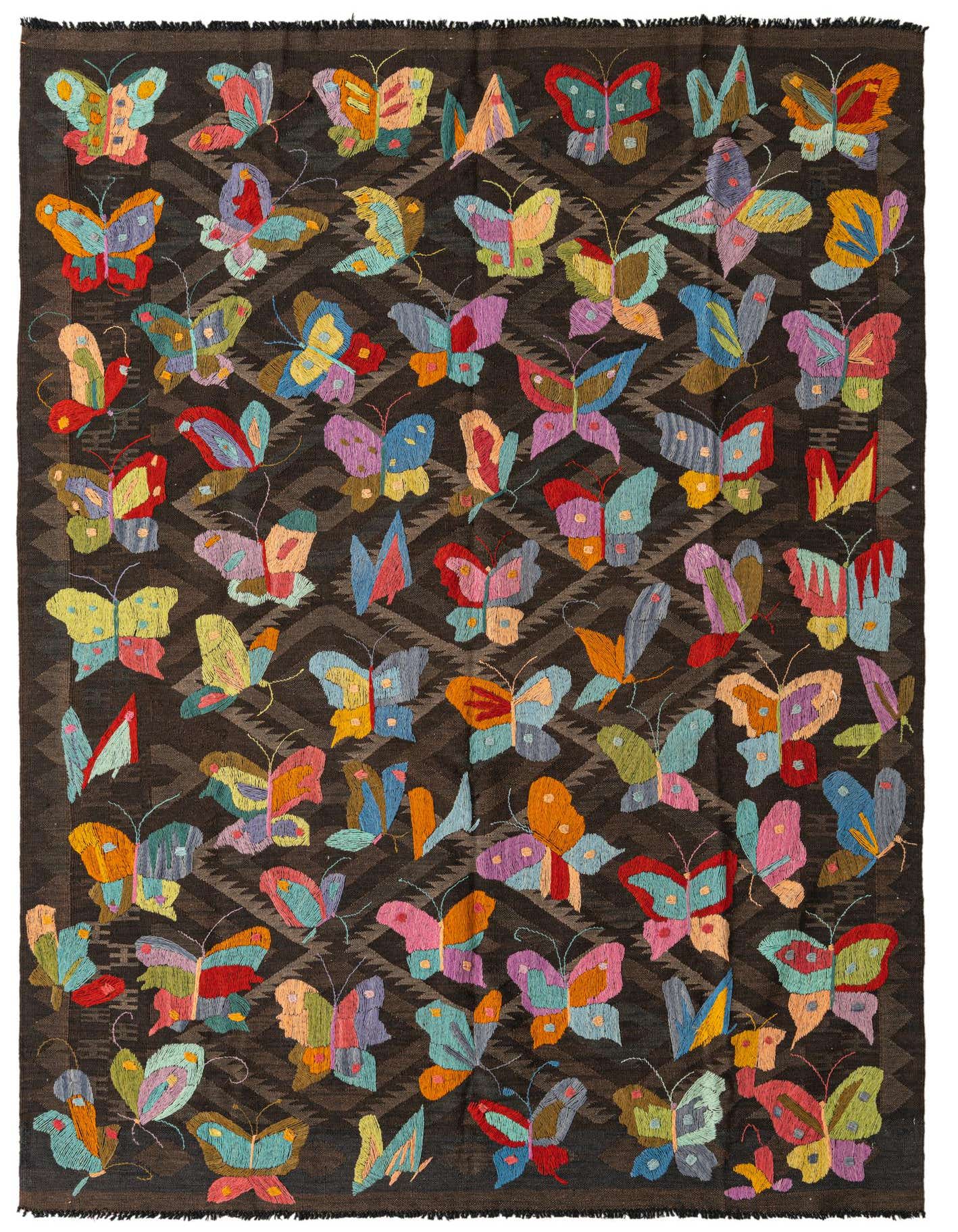 A 5x8 rectangular brown Kilim Suzani rug with a vibrant, colorful butterfly pattern, ideal for a living room.