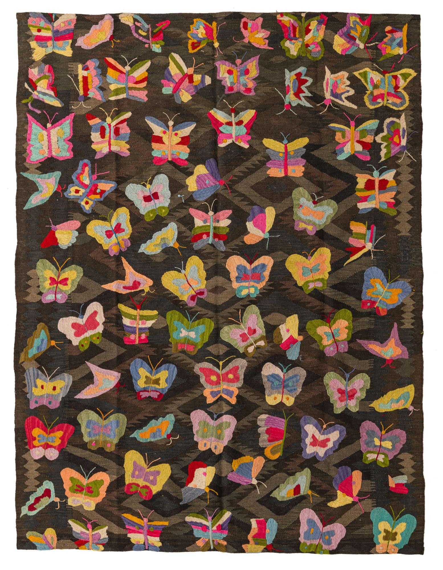 A 5x8 rectangular Kilim Suzani rug featuring a dark brown tribal pattern background with numerous colorful butterfly appliques.