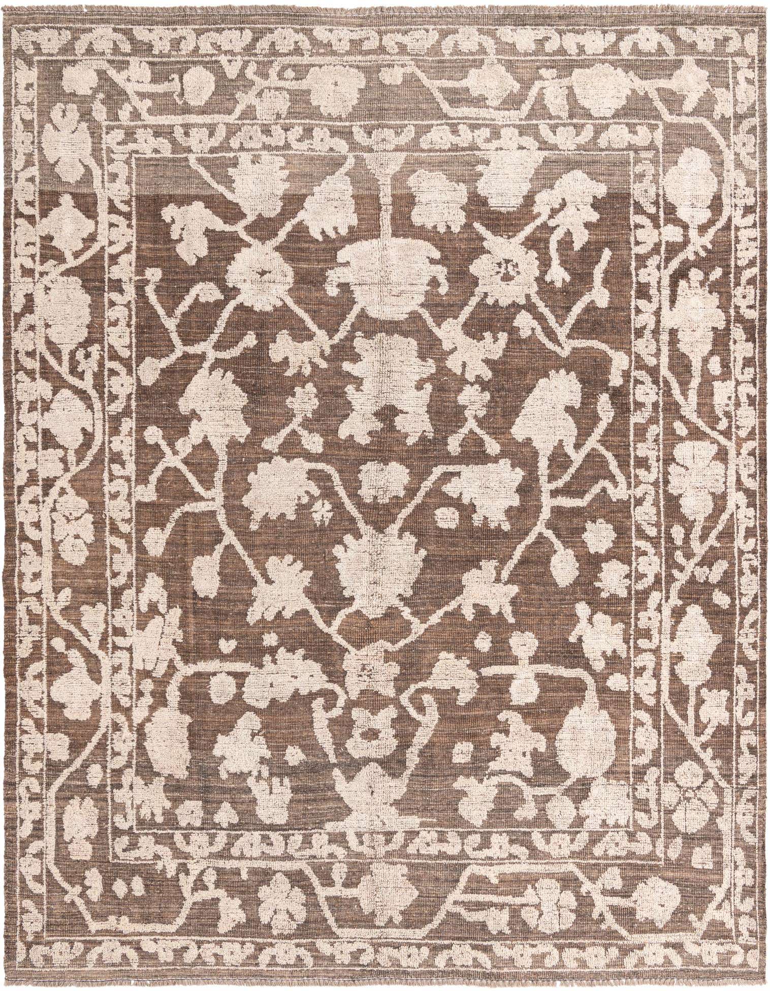 A 9x12 rectangular brown wool rug with a modern tan floral and vine pattern, featuring a decorative border.