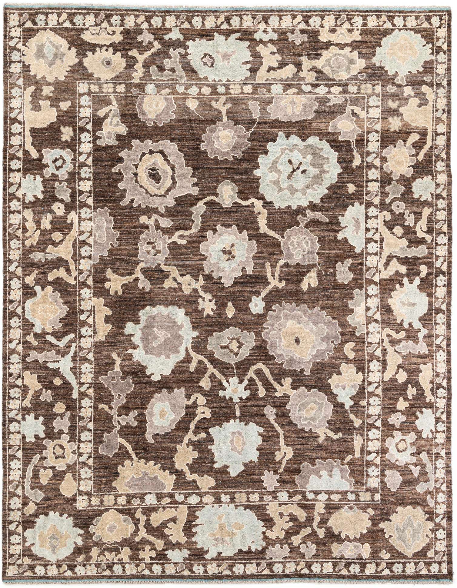 A 9x12 rectangular brown wool rug with a modern floral Oushak pattern in tan, cream, and light blue, perfect for a living room.