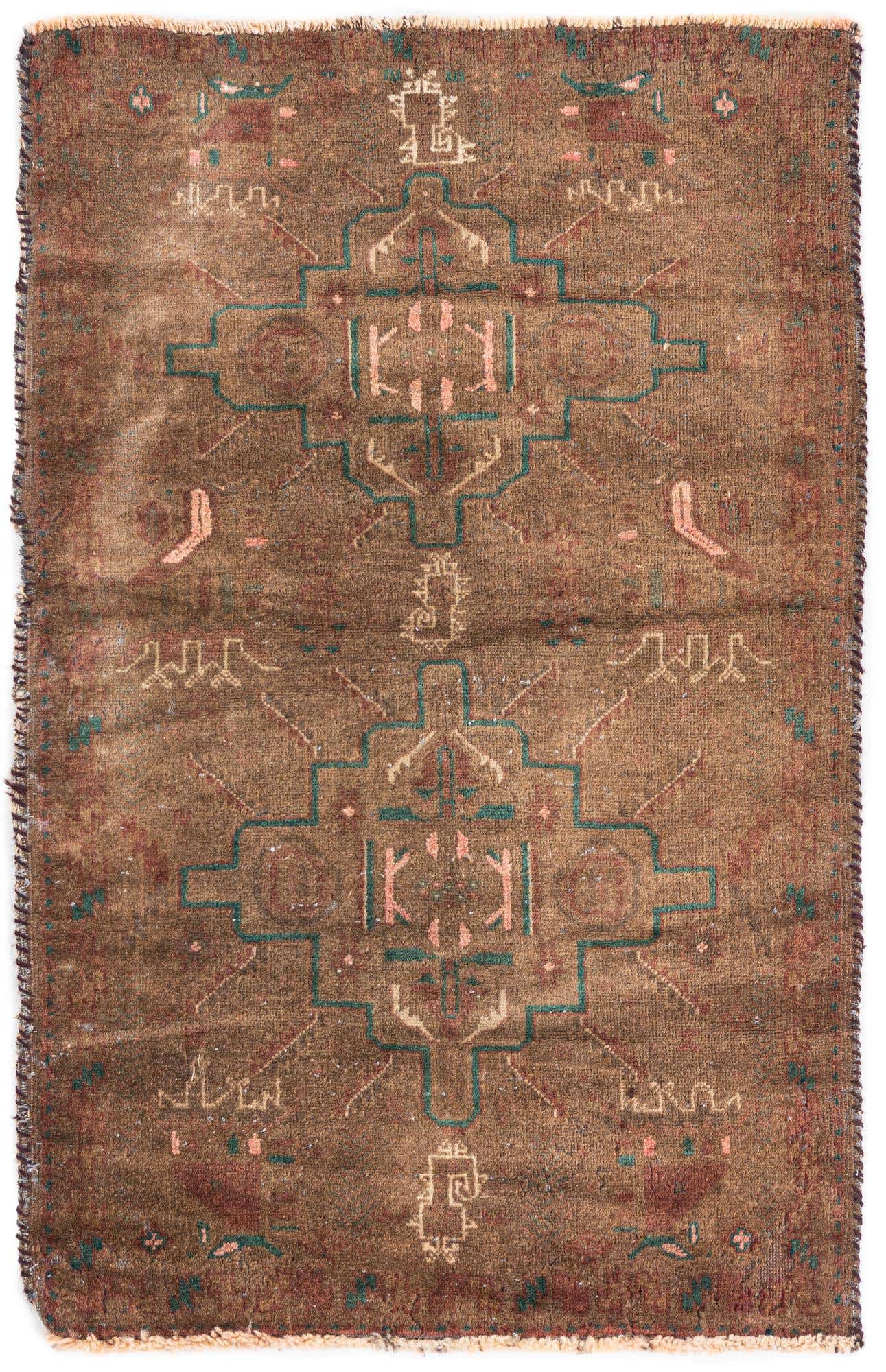 A 3x4 rectangular brown and tan wool rug with a distressed Persian medallion pattern and teal accents.