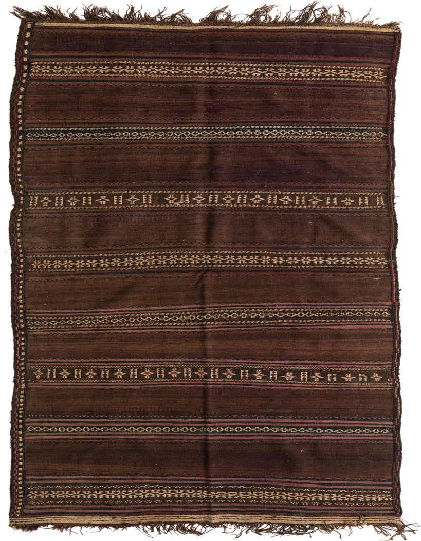 A long, flatweave Kilim Fars runner rug in deep browns and tans, featuring intricate tribal patterns and fringed ends, ideal for a hallway.