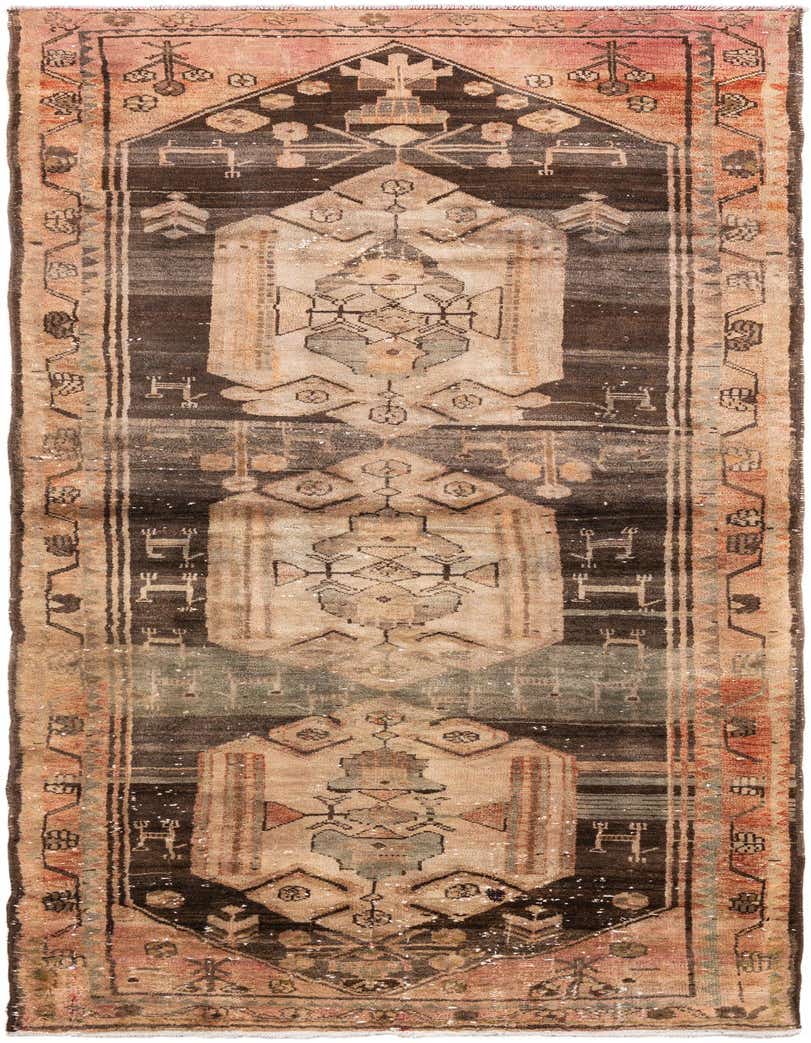 A 9 ft runner rug in browns and tans with a vintage Persian medallion pattern, ideal for a hallway.