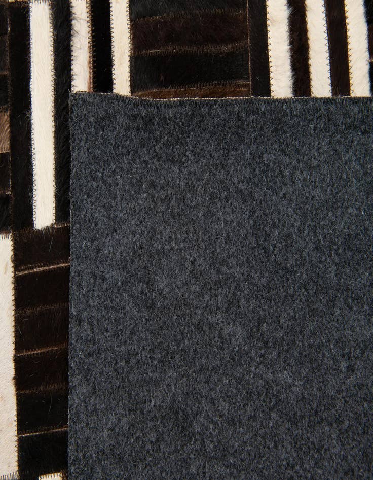 Detail image of  5' 11 x 6' 7 Cowhide Stocks Square Rug