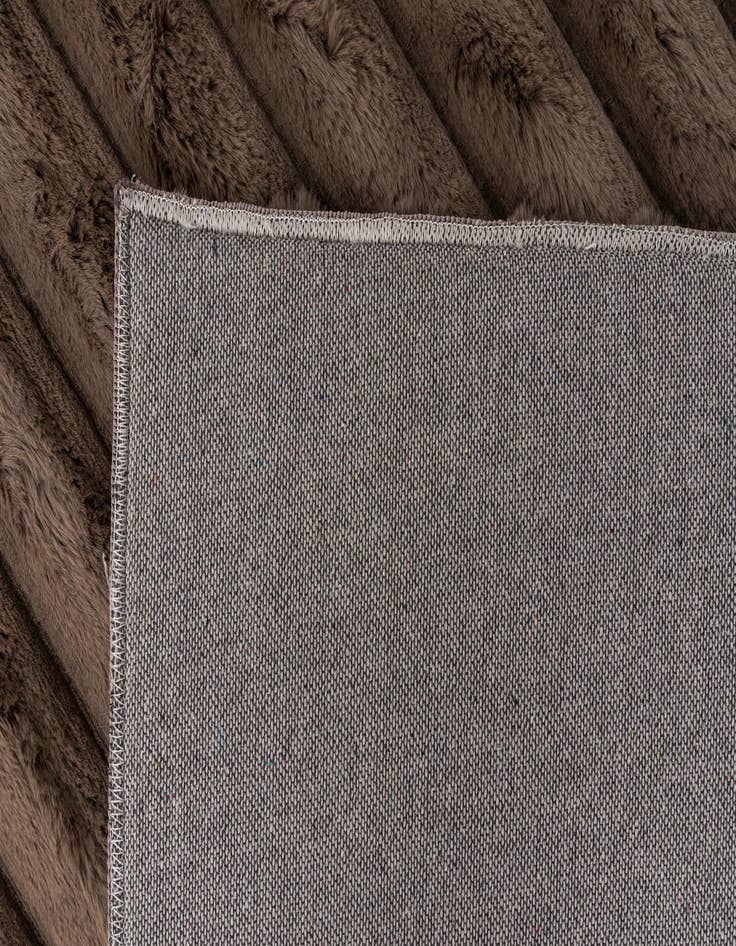 Detail image of  5' x 7' Carved Solid Rabbit Rug