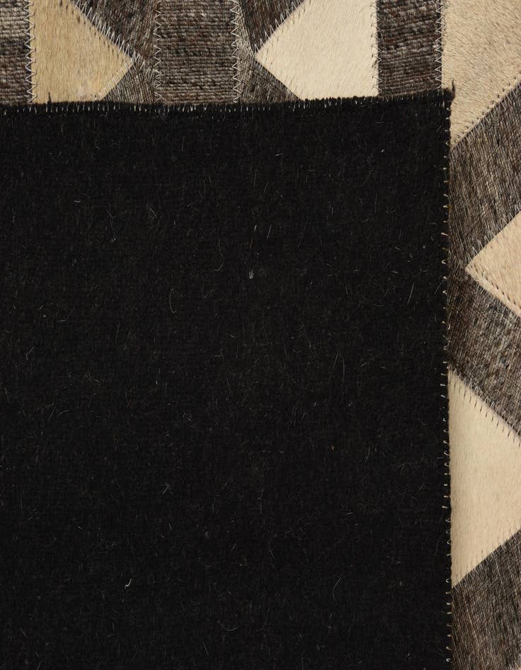 Detail image of  5' 1 x 7' 9 Cowhide Rug