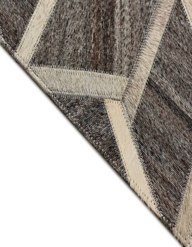 Detail image of  5' 1 x 8' 2 Cowhide Rug