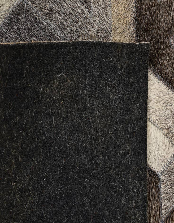 Detail image of  2' 1 x 3' Cowhide Rug