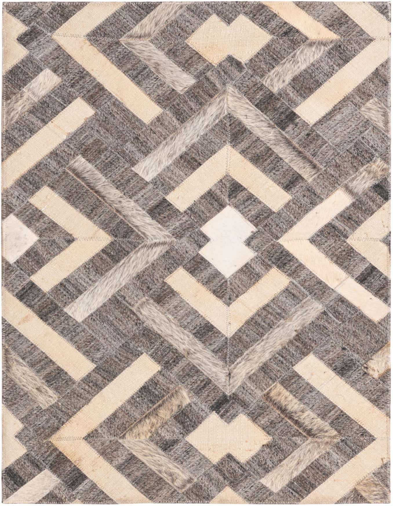 A 2x3 rectangular Cowhide rug featuring a modern geometric pattern in various shades of gray and silver with cream accents.