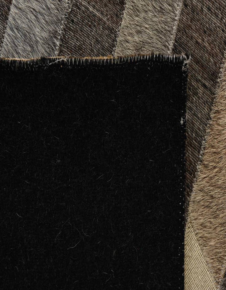 Detail image of  2' 1 x 3' 3 Cowhide Rug