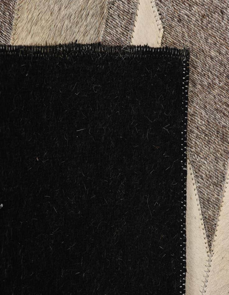 Detail image of  2' 1 x 3' 2 Cowhide Rug