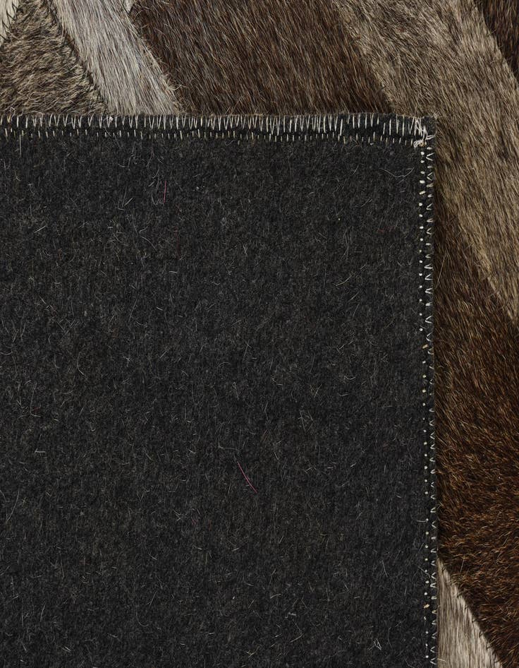 Detail image of  2' 1 x 3' 3 Cowhide Rug