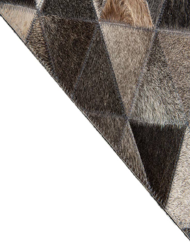 Detail image of  5' 1 x 8' 1 Cowhide Stocks Rug