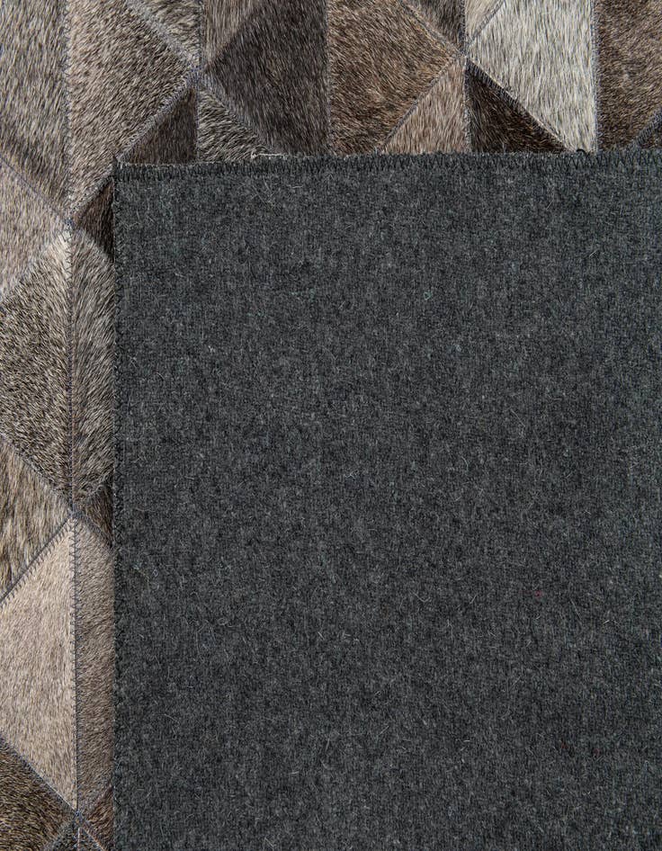 Detail image of  5' 1 x 8' 1 Cowhide Stocks Rug