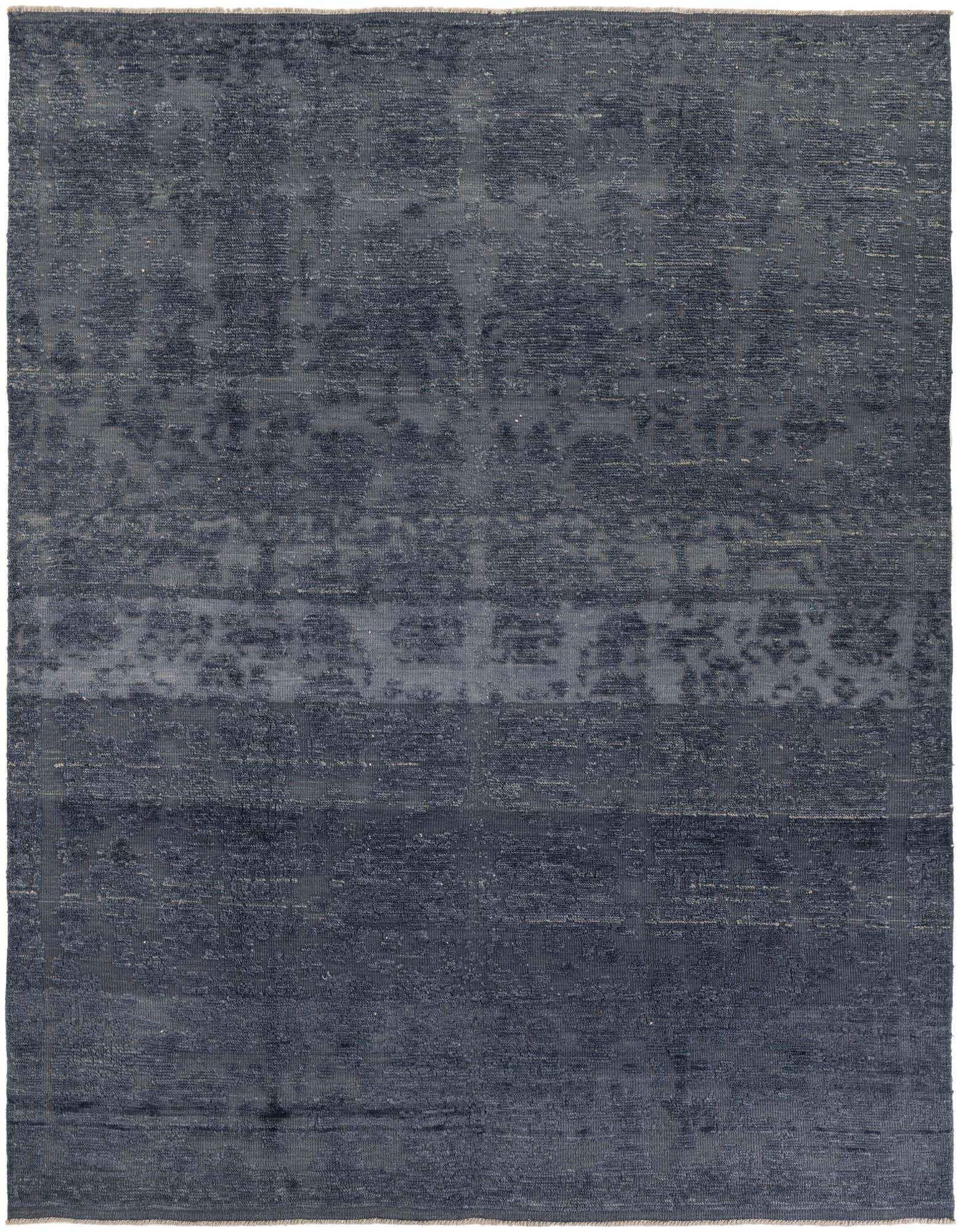 A rectangular 8x10 Darya rug in varying shades of gray with a subtle, abstract modern pattern, suitable for a living room.