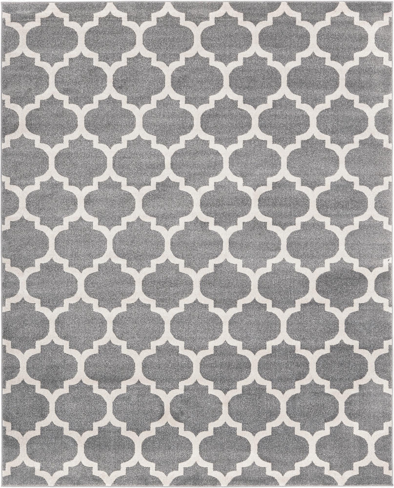 A rectangular 8x10 gray modern trellis area rug with a repeating white quatrefoil pattern.