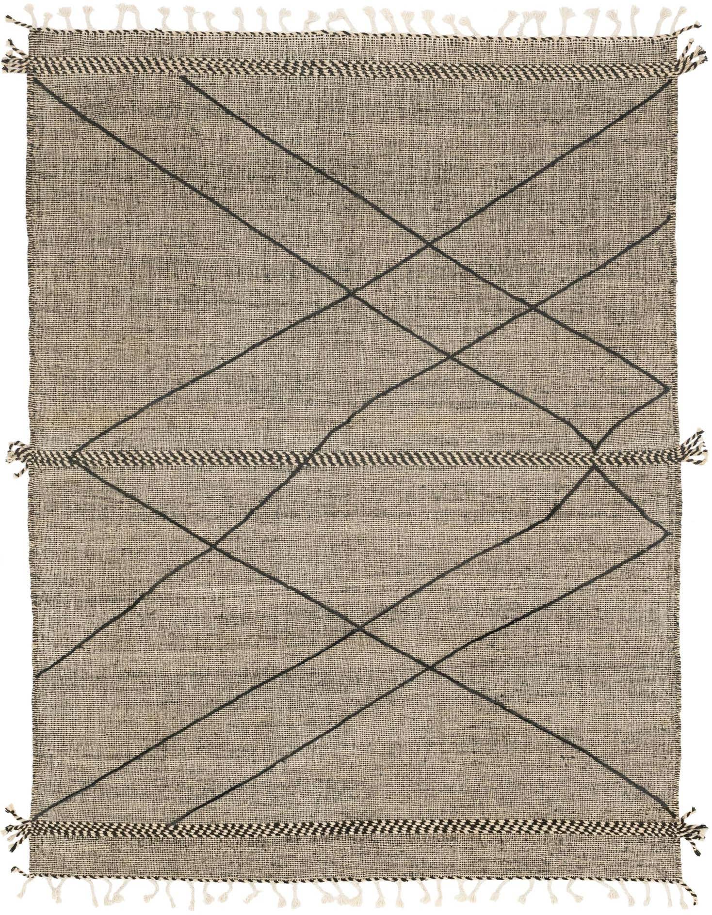 A 7x10 rectangular gray wool shag rug featuring a modern tribal abstract pattern with black geometric lines and decorative tassels.