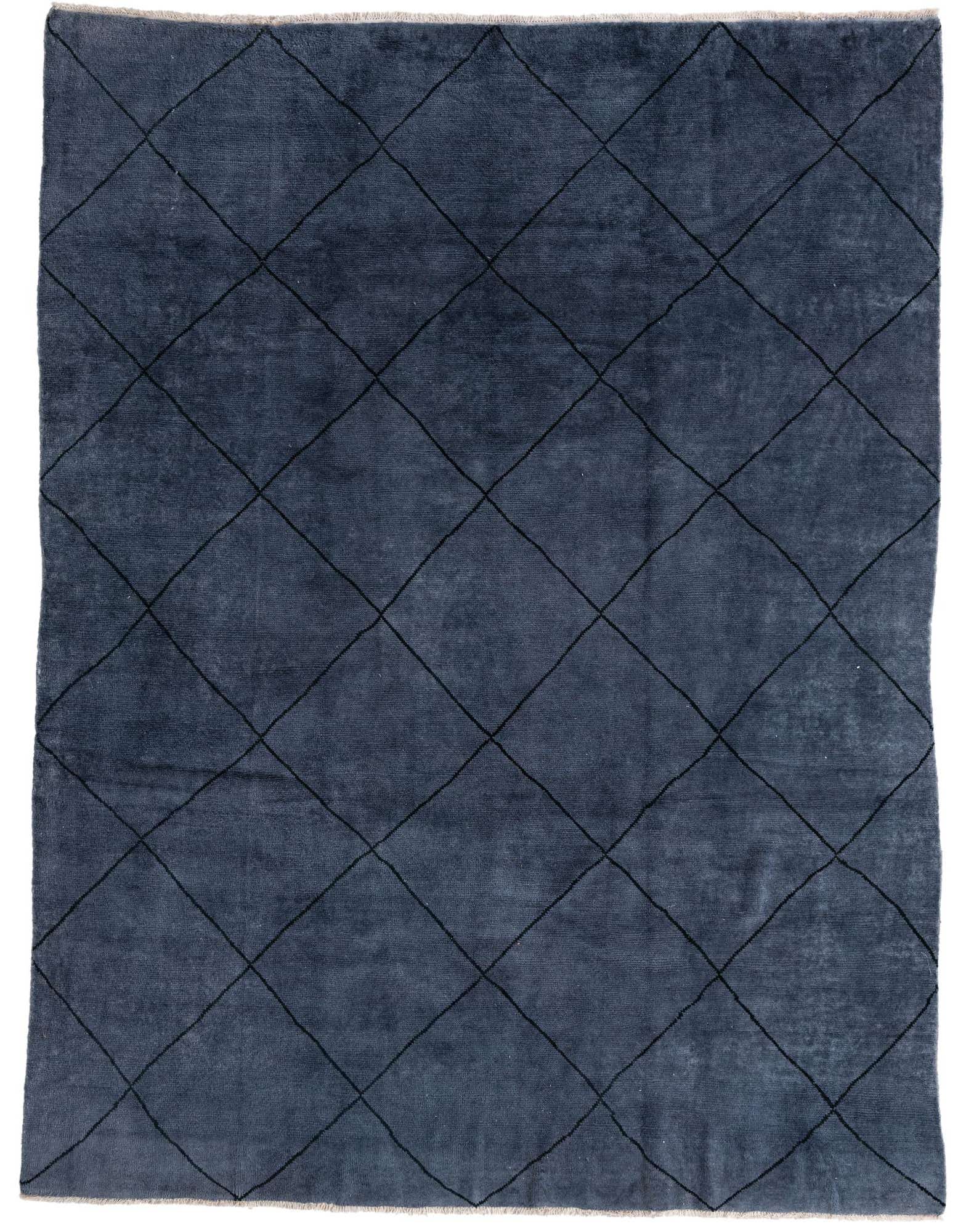 A rectangular 8x10 gray shag rug with a subtle black diamond tribal pattern, ideal for a modern living room.