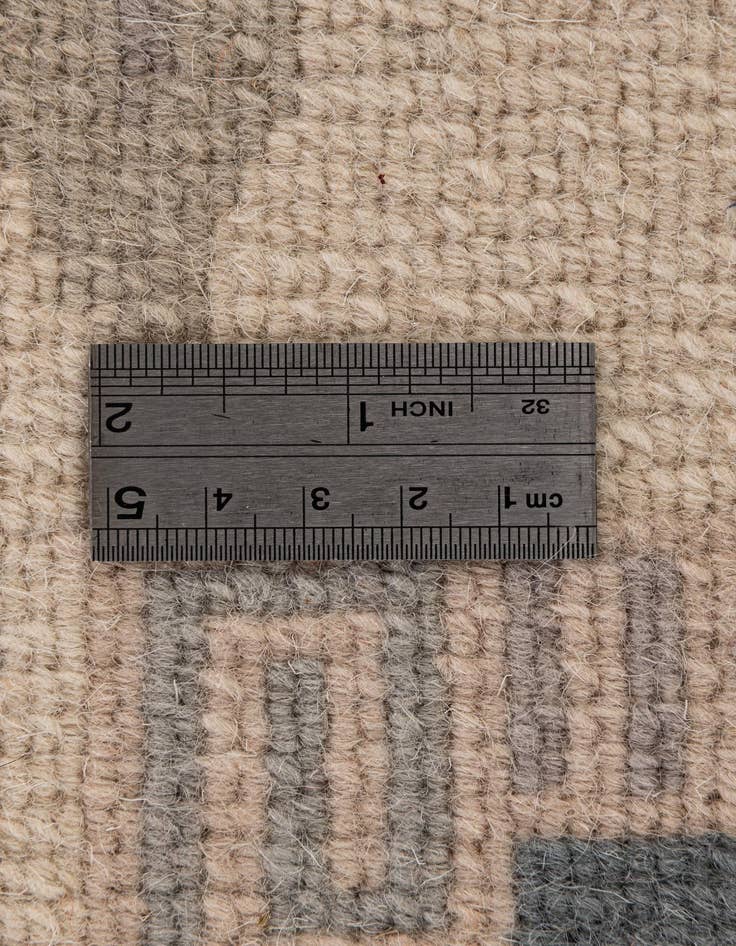 Detail image of  5' 7 x 7' 10  Hand Knotted Tibet Wool Rug