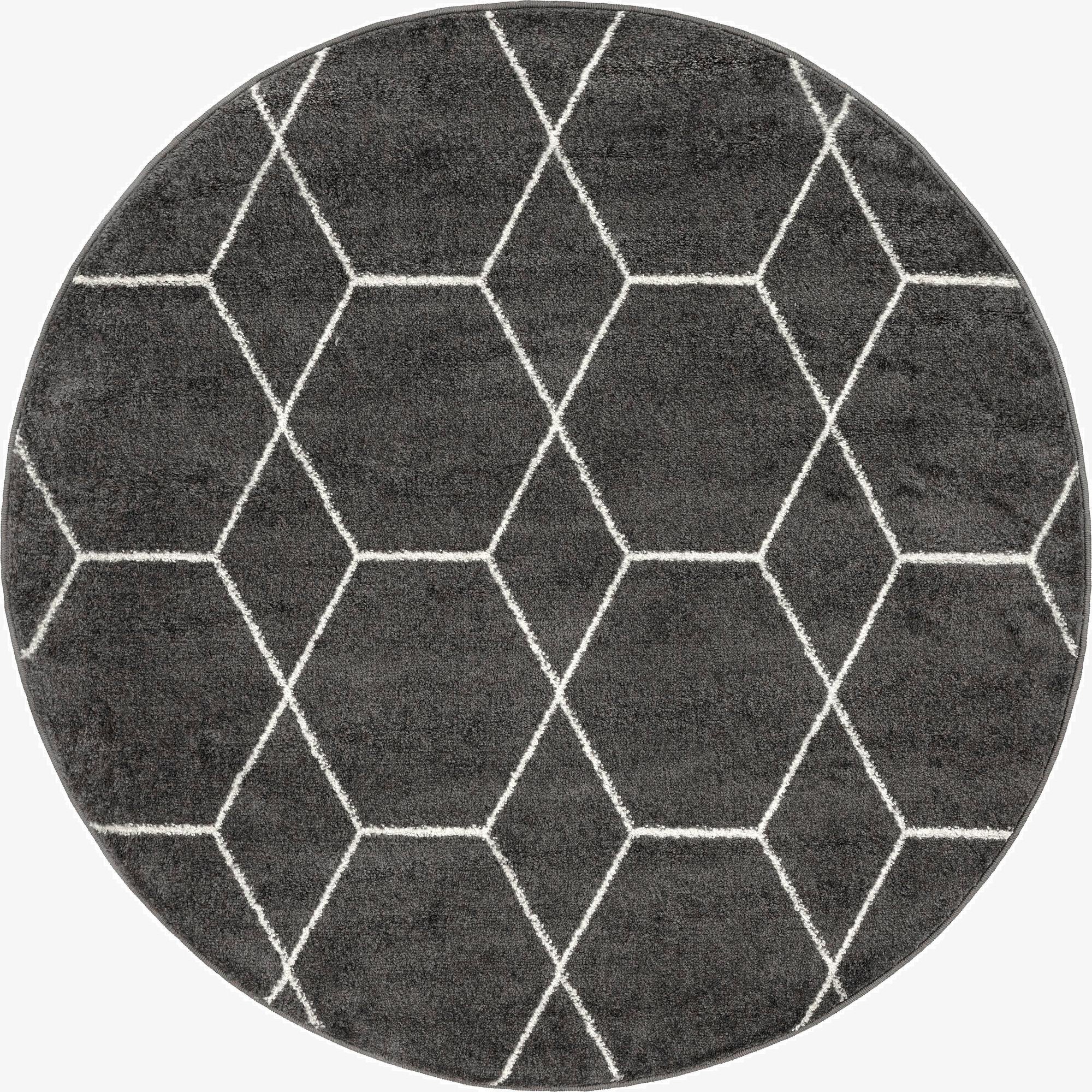 A 4' round gray rug with a modern white geometric trellis pattern, suitable for various indoor spaces.