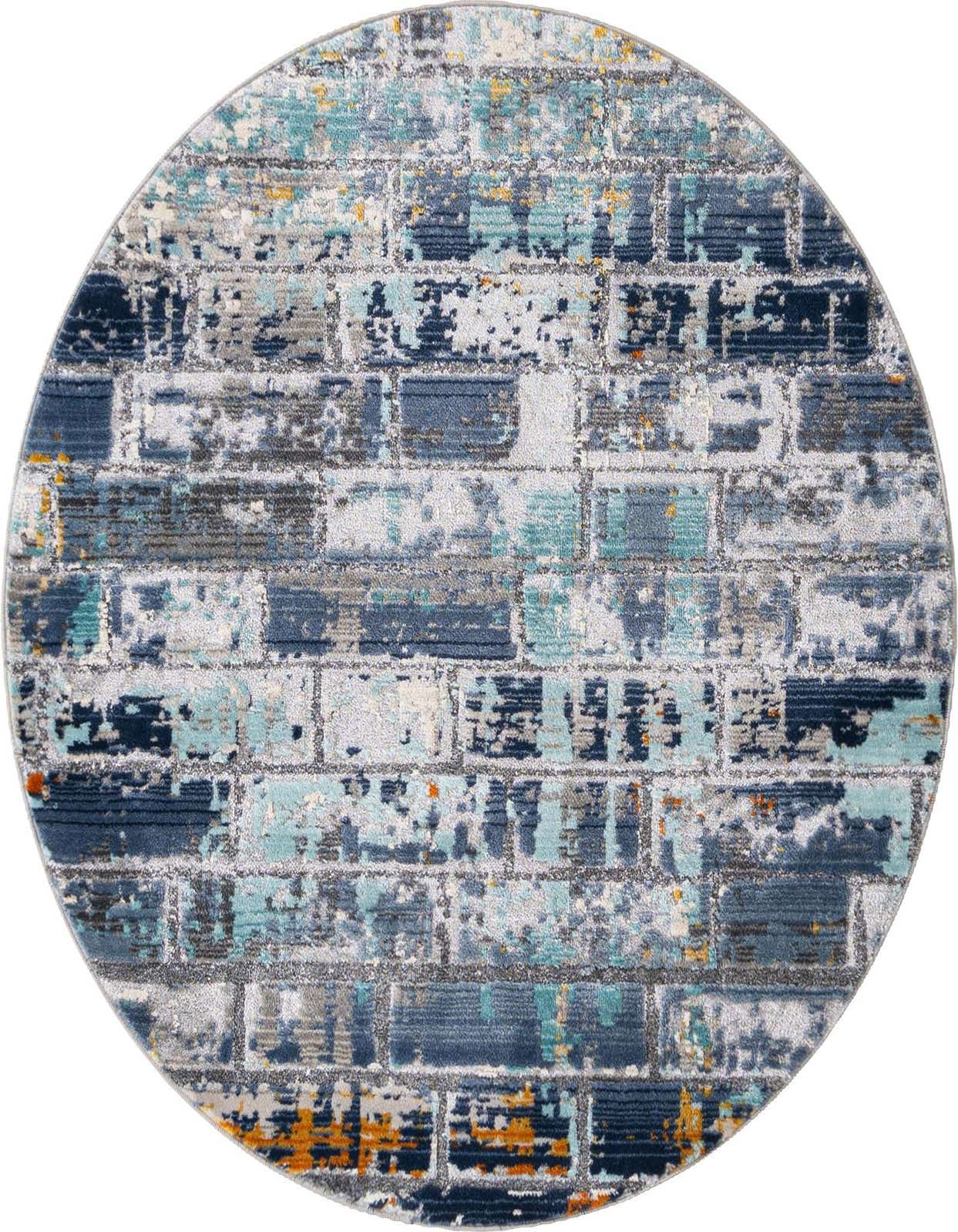 A round gray, blue, and teal rug with an abstract, distressed brick-like pattern, featuring hints of orange.