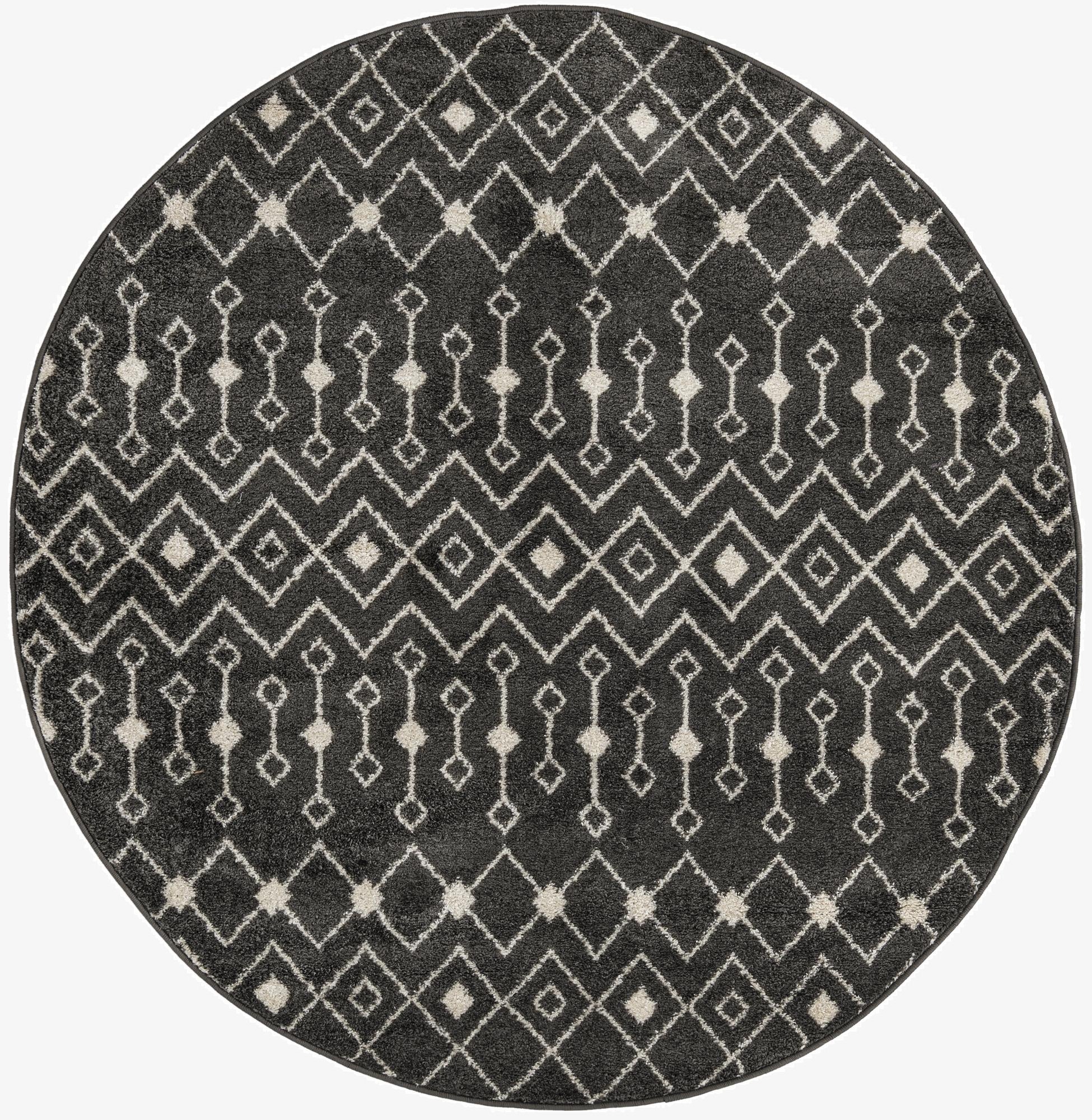 A round 6' 0 x 6' 0 gray Moroccan Trellis rug with a bohemian diamond and tribal pattern.