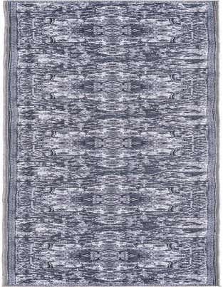 A 13 ft runner rug from the Francesca collection, featuring a distressed gray and silver traditional medallion pattern.